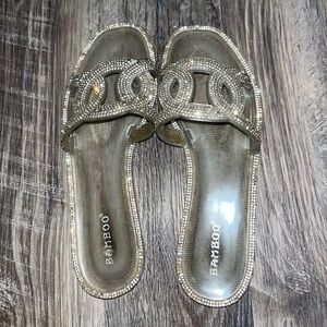 Sparkly slide on sandals. Worn.